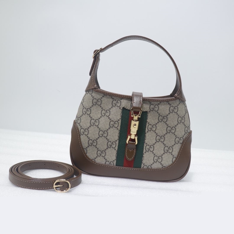 G*u*i top handle bags